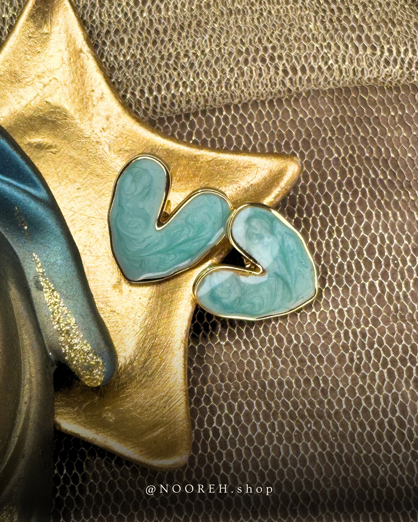 Aqua love statement earring